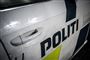 Siden af en beskidt politibil 