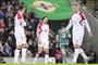 fodboldspillere i aktion
