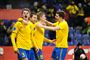 fodboldspillere i aktion