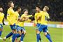 fodboldspillere i aktion