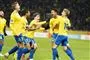 fodboldspillere i aktion