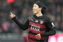 fodboldspillere i aktion