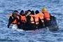 migranter i en båd