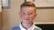 en dreng smiler