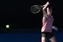 tennisspiller i aktion på banen