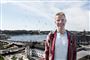 en glad mand med udsigt over København 