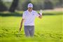 Golfspiller vinker