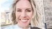 Kvinde smiler
