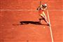 tennisspiller i aktion på banen