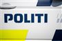 Siden af en politibil 