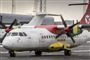 Flyvemaskine i lufthavn