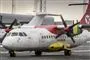 Flyvemaskine i lufthavn