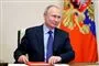 en smilende Putin