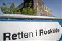 skilt med logo