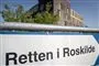 skilt med logo