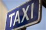 Et skilt med Taxi