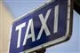 Et skilt med Taxi