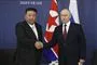 Putin og Kim Jong-un trykker hænder