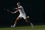 en tennisspiller i aktion