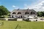 villa med stråtag