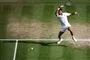 en tennisspiller på banen