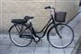 En damecykel med elmotor