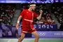 badmintonspiller på knæ