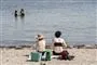 folk på strand