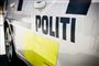 Siden af en politibil 