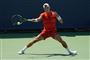 tennisspiller i aktion på banen