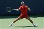 tennisspiller i aktion på banen