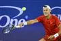 tennisspiller i aktion på banen