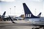 Nogle SAS-fly risikerer at stå stille eller flyve uregelmæssigt, hvis det norske kabinepersonale ikke bliver enige med selskabet om bedre arbejdsvilkår. (Arkivfoto).