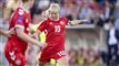 fodboldspillere i aktion