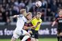 fodboldspillere i aktion