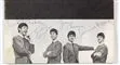 Program med de fire beatlesmedlemmer og deres autografer