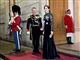 Kong Frederik og dronning Mary smiler