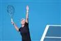 tennisspiller i aktion på banen