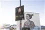 valgplakat hænger på lygtepæl