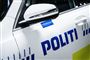 ordet politi på døren af politibil