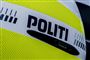 politi står som logo på politibil