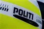 politi står som logo på politibil