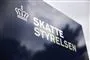 en facade med et logo for skat