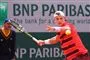 Tennisspiller på banen