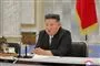 kim Jong ved et skrivebord