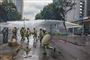 Kenyanske urobetjente i aktion under protester.