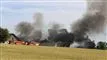 brand og sort røg fra bygninger
