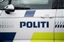 politilogo på bildør