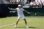 tennisspiller varmer op