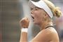 tennisspiller jubler 
